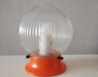 Vintage orange lamp from the 1990's with metal base and glass globe