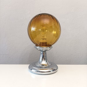 Space Age chrome table lamp with large hand blown amber glass globe from Italy circa 1960 MCM table lamp with glass shade