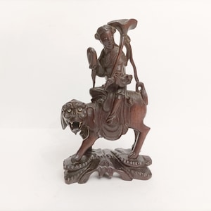 Vintage Chinese wood sculpture of foo dog and warrior circa 1950 detailed hand carved wooden figure of chinese foo dog and man