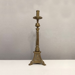 Antique bronze church candlestick with images of Jesus Mary and Joseph circa 1890