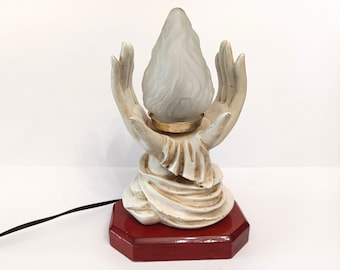 Vintage hands table lamp with flame shade from the 1940s religious plaster hands lamp with wooden base