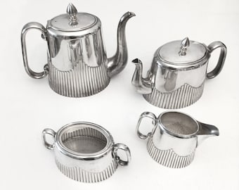 Antique art deco tea and coffee set circa 1920 silver plated teapot sugar and creamer coffee pot