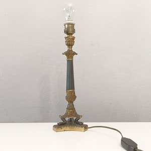 Antique French bronze and brass neoclassical table lamp with three feet circa 1920 Tall brass lamp from France