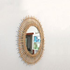 Vintage mid century modern bamboo sunburst mirror from the 1960s Boho chic rattan or cane mirror