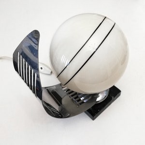 Space age chrome table lamp with white glass globe and black and white marble base circa 1970 Mcm vintage lamp with glass shade
