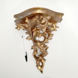 Antique wooden corbel or  rococo wall shelf circa 1900 from Spain Ornate hanging pedestal made of wood and gesso