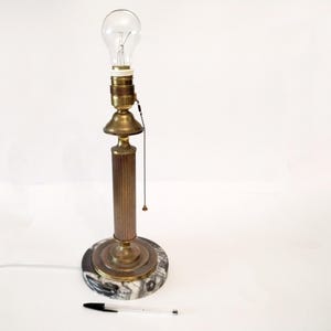 Brass Neo-classical style table lamp with marble base from Spain circa 1950 Vintage Spanish lamp with black and white marble