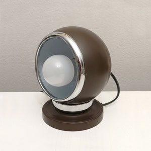 Vintage space age brown metal eyeball from the 1980s/90s.
