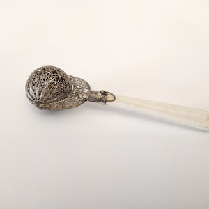 Antique silver filigree baby rattle very rare Spain circa 1900 with white handle collectors rattle