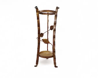 Brutalist umbrella stand with three feet and leaves circa 1950 mcm umbrella stand or walking stick stand or cane holder from Spain