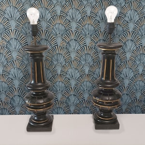 Pair of large antique black lacquered wood table lamps from Spain circa 1880 pair black and gold wooden lamps from country manor house Spain