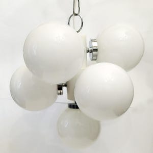Atomic Space age Sputnik white  and chrome pendant light with seven white glass globes circa 1960 Vintage ceiling light with glass shades