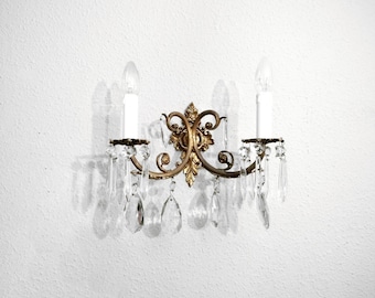 Pair of ornate brass wall sconces with crystals and faux candles from France circa 1940 Large antique French brass sconces