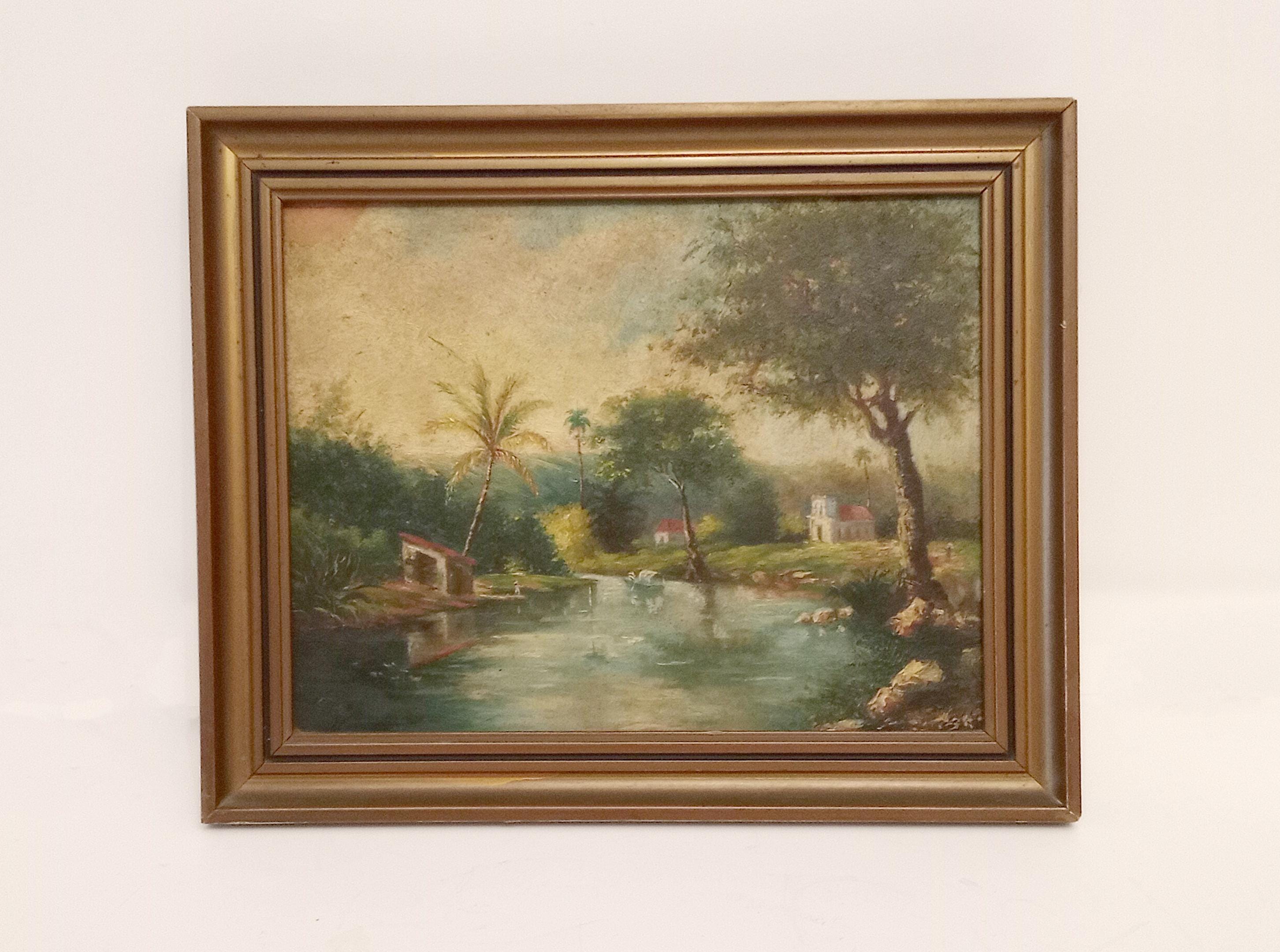 Original French painting on wood circa 1930 framed landscape oil painting with gold wooden frame of houses by the river and trees painting