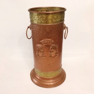 Vintage hammered copper and  brass umbrella stand with two handles and king and queen circa 1970 mcm cane or walking stick stand from Spain