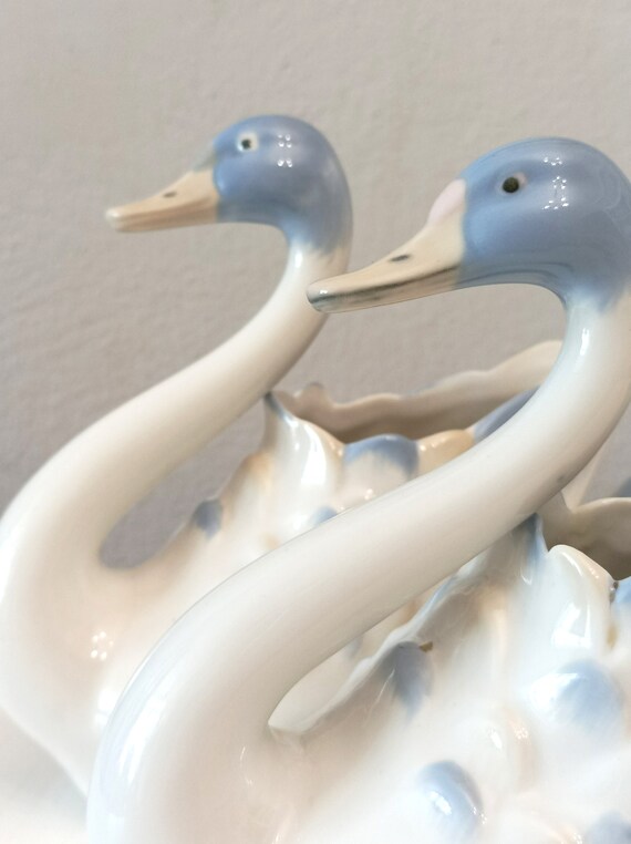 A Pair of Mid Century Modern Porcelain Swan Vases or Centerpieces