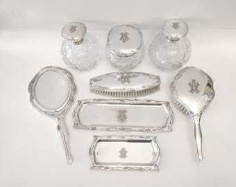 Eight-piece Alpaca vanity set with hair brush hand mirror coat brush perfume jars cream jar and tray circa 1940 boudoir set  Spain by Medhur