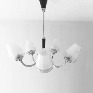 Mid century modern black and chrome chandelier with five glass shades from the 1950s retro mcm pendant light