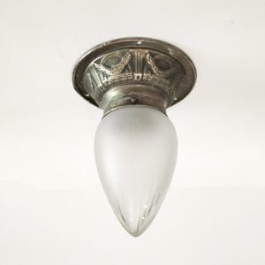 Art Deco frosted cut glass ceiling light with ornate silver coloured base circa 1900  Small antique flush mount ceiling light from Spain