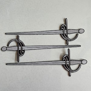 May include: Three embroidered patches of a rapier sword. The patches feature a gray blade, a detailed hilt, and a gray handle. The patches are arranged in a horizontal line against a white background.