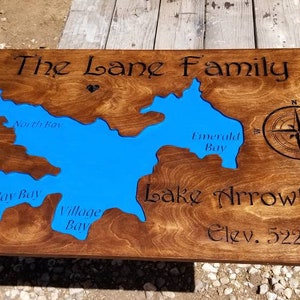 Custom carved lake arrowhead family wall plaque