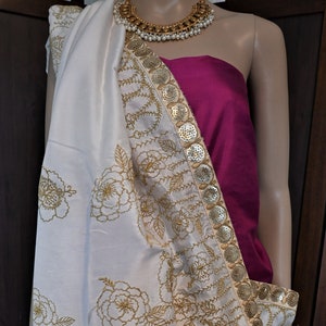 Pure silk sari with silk thread embroidery and zari with tassels on the pallu