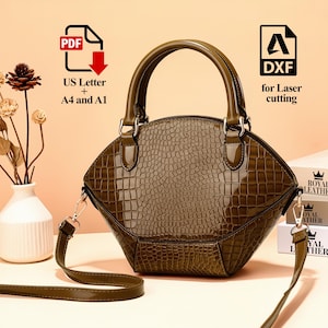 Peut inclure: Sac &agrave; main vert olive avec une texture imitation peau de crocodile, dot&eacute; d'une poign&eacute;e sup&eacute;rieure et d'une bandouli&egrave;re amovible. Le sac a une finition brillante et des &eacute;l&eacute;ments m&eacute;talliques. Le texte de l'image indique "PDF US Letter + A4 and A1" et "DXF for Laser cutting".