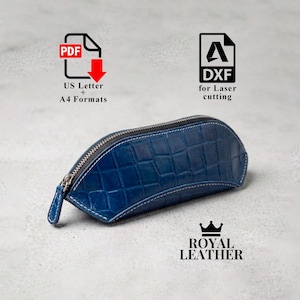 May include: A blue, semi-circular zipped pouch with a textured crocodile-skin pattern and white stitching. The image includes icons for PDF US Letter and A4 formats, a DXF icon for laser cutting, and the text Royal Leather at the bottom.