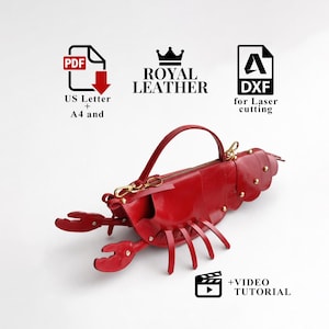 May include: A red leather lobster-shaped handbag with a top handle and gold-coloured hardware. The bag features a zip closure and is adorned with small gold studs. The image includes text that says "Royal Leather" and "DXF for Laser cutting".