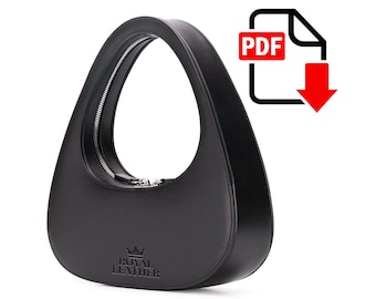 May include: Black leather handbag with a crescent moon shape and a zipper closure. The bag has a small crown logo with the text "Royal Leather".