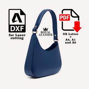 Puede incluir: Un bolso de hombro azul marino con forma de media luna. Cuenta con una sola correa y detalles metálicos dorados. La imagen incluye texto: "DXF for Laser cutting" y "US Letter + A4, A1 and A0". El bolso es de "ROYAL LEATHER".