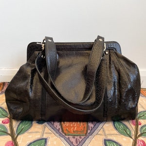 Black leather outlet top handle bag