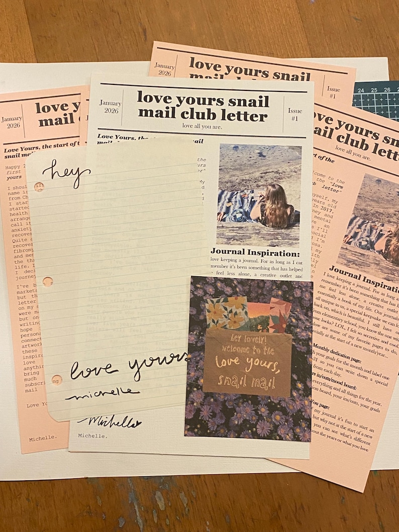 May include: A collection of printed paper stationery including a newsletter titled love yours snail mail club letter, a lined sheet with the handwritten text hey and love yours, and a small card with the text hey lovely! welcome to the love yours, snail mail.