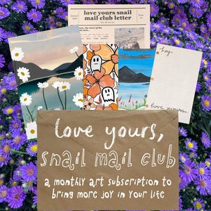 May include: A brown paper envelope with the white text love yours, snail mail club, a monthly art subscription to bring more joy in your life, surrounded by various art prints including a landscape with daisies, a ghost floral pattern, and a letter.