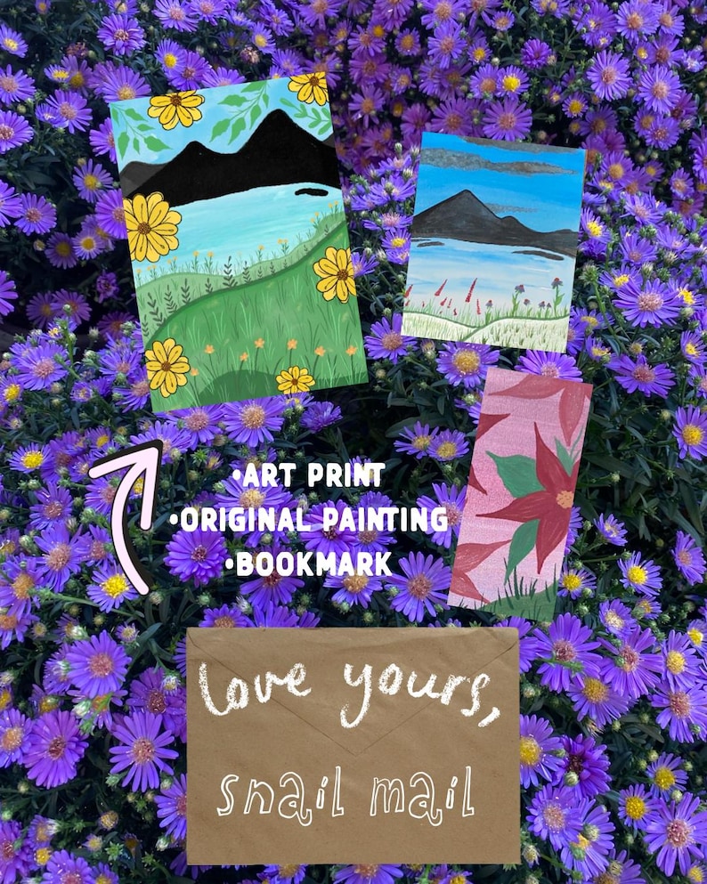 May include: An art print, an original painting, and a bookmark featuring landscape illustrations, accompanied by a brown envelope with the white handwritten text "love yours, snail mail" and a pink arrow pointing toward the art items.