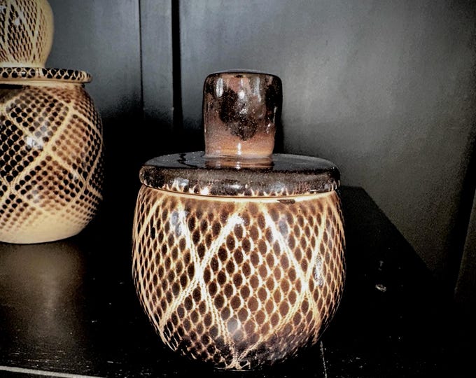 Decorative lidded ceramic jar