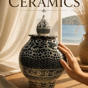 May include: A ceramic jar with a lid featuring a black and white lace-like pattern. The text HANDCRAFTED CERAMICS is displayed above the jar, while paintingsandpottery.com and iLoveCeramics.net are printed at the bottom of the image.