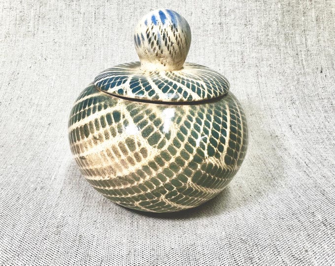 Decorative lidded ceramic jar