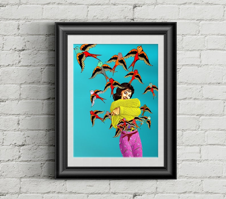 May include: A woman in a yellow sweater and pink pants smiles as she is surrounded by colorful birds with red, blue, and green accents against a turquoise background.