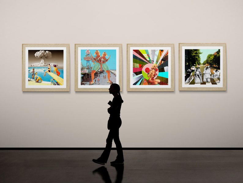 May include: Four framed art prints displayed on a white wall. The prints feature a variety of colorful and abstract designs. A person is walking in front of the wall, looking at the art.