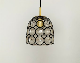 1 of 2 Mid-Century Modern iron ring design glass pendant lamps by Glashütte Limburg | 1960s