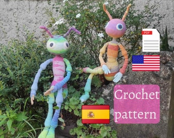May include: Two vibrant, crocheted insect dolls with long limbs and antennae. One stands, the other sits. The dolls are made with a variety of colours, including pink, blue, green, and orange. The image includes the text "Crochet pattern".