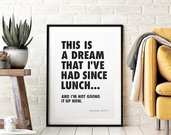 May include: Black and white framed print with a quote from the TV show "The Office" by Michael Scott. The quote reads: "This is a dream that I've had since lunch... and I'm not giving it up now."