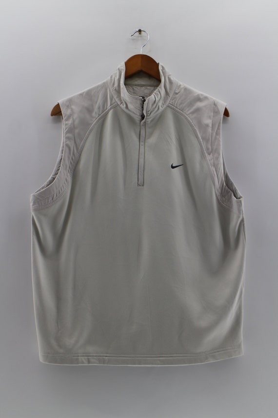 nike sleeveless jacket