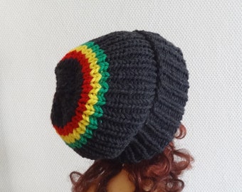 May include: Black knit beanie with a red, yellow, and green stripe around the bottom.