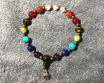 Pulsera de piedras preciosas de los 7 chakras con dije OM de plata de ley