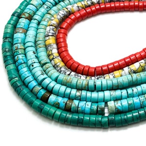 May include: A strand of turquoise and red beads. The beads are round and have a smooth, polished finish. The turquoise beads are a variety of shades of blue and green, while the red beads are a bright, vibrant red.