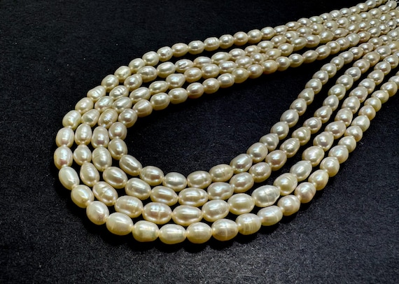 AAA White Fresh Water Pearl 4mm x 6mm Barrel Pebble Oval Rice Beads- PGS77