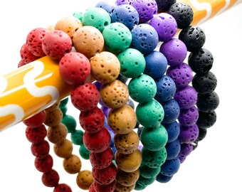 Pulsera elástica hecha a mano con cuentas de lava redondas de 8 mm, color rojo, beige, verde, azul, morado y negro - PGB211