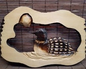 Carved loon wall hanger. Loon wall art. Loon statue. Wooden wall art. Home decor.